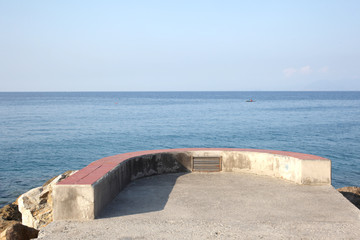 seaside pier on italian coast in morning light