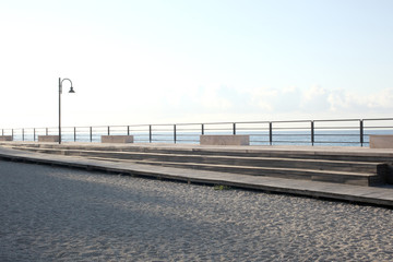 Fototapeta premium seaside pier on italian coast in morning light