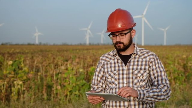 Engineer at Work in a Wind Turbine Power Station. Slow motion