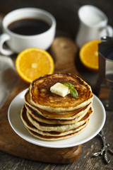 Homemade pancakes with honey and butter