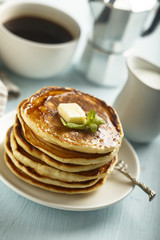 Homemade pancakes with honey and butter