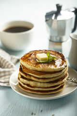 Homemade pancakes with honey and butter