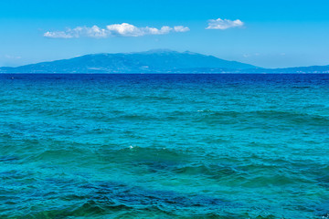 Fototapeta premium Panoramic view of Aegean sea at Chalkidiki, Greece. Proti Ammoudia beach, one of the most beautiful beaches in the Aegean Sea.