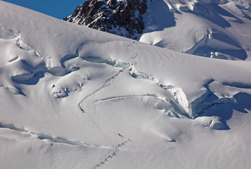 Pointe Lachenal, Chamonix, south-east France, Auvergne-Rhône-Alpes. Climbers heading for Mont...