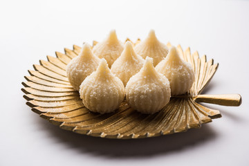Sweet Modak made using coconut, khoya and sugar. Popular Maharashtrian recipe offered to lord...