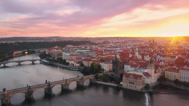 Drone aerial shot of prague city old town flight forward to charles bridge