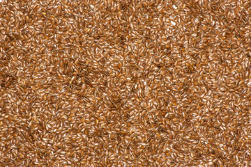Fresh brown flaxseeds isolated