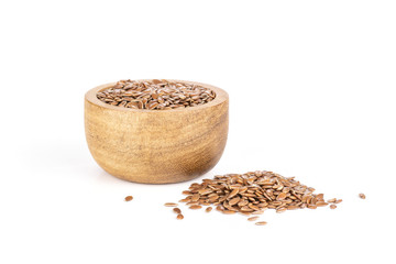 Fresh brown flaxseeds isolated on white