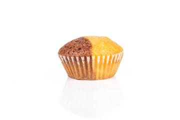 One whole tasty fresh baked marble muffin isolated on white background