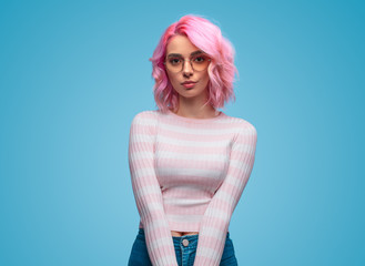 Modern hipster woman on blue background