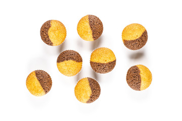 Group of eight whole fresh baked marble muffin flatlay isolated on white background