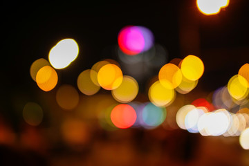 Fototapeta premium Bokeh miasto przy nocą jako abstrakcjonistyczny tło