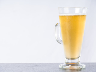 Beer in glass on white,