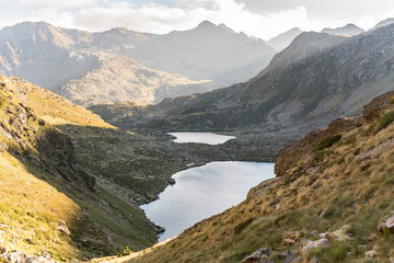 Naklejka na ściany i meble Tristaina high mountain lakes in Pyrenees. Andorra