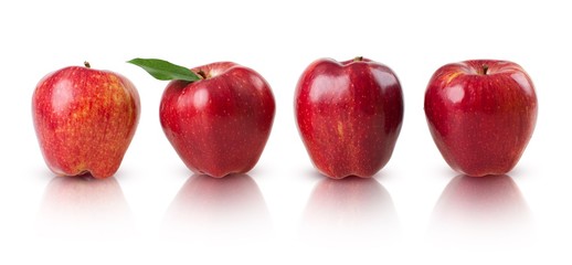 Line of apples with one apple having a leaf