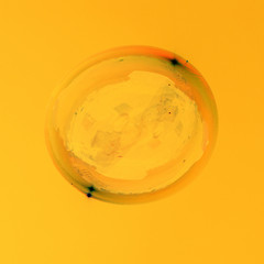 Soap bubbles on a golden background