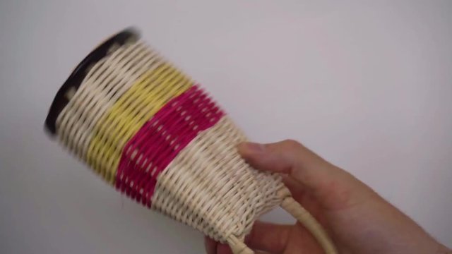 Coconut based shaker playing rhythmic pattern