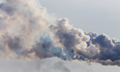 Smoke from the pipes of the factory