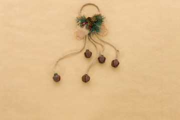 Cute festive decorations on a natural paper background with space for copy