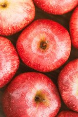 Harvest of ripe apples variety Red Delicious. Food background, top view, flat lay.