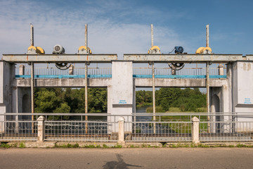 Fototapeta na wymiar metal structures and supports of dam lock of hydroelectric power station