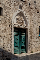 Fototapeta na wymiar Portal with eagle of Rossini palace in Sibenik