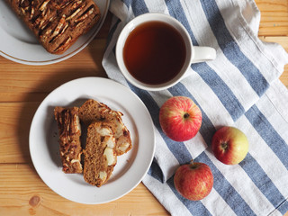 apple pie with tea. Homemade seasonal autumn dessert. Horizontal top view