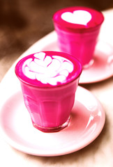 Cup of hot latte coffee on marble table background