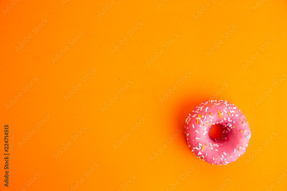 Poster pink donut in colorful background