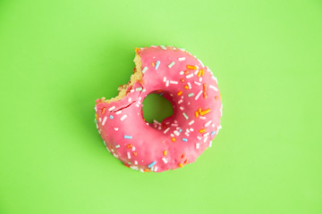 pink donut in colorful background