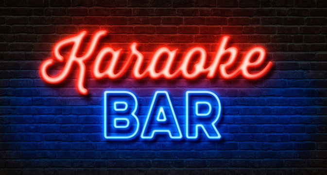 Neon sign on a brick wall - Karaoke Bar