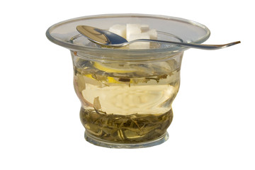 The cup of green tea isolated over white