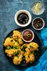 Chicken wings in breading. Deep fried chicken wing. American food. Top view