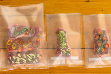 Vacuum packed flat iron steaks for freezing