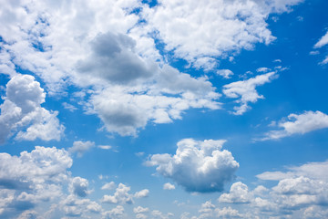 White fluffy clouds on a blue sky