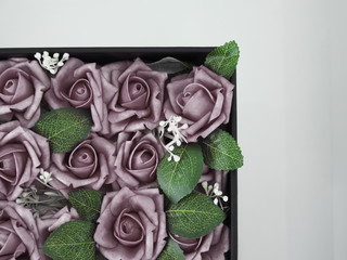 Plastic flower decorations add beauty and durability.