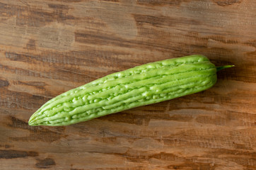  Fresh bitter gourd or bitter melon on wood background