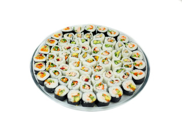 sushi rolls on the plate isolated on white