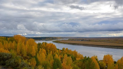 Obraz premium autumn landscape with lake and blue sky