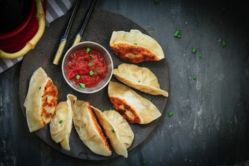Homemade Nepali Momos Dumplings served with Tomato chutney, Overhead view