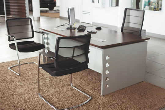 Modern Office Interior: A Table, Two Chairs And A Laptop.