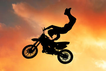 illustration of motocross at sunset