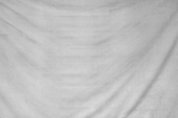 Fototapeta premium The surface of crumpled dirty grey canvas