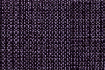 Dark violet textile background with checkered pattern, closeup. Structure of the fabric macro.