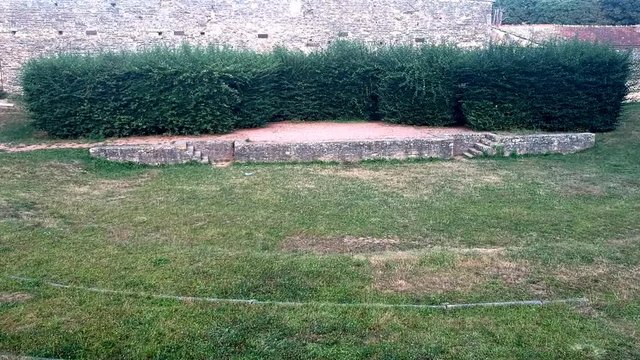 Flying towards to small amphitheater stage in France, Cluny.