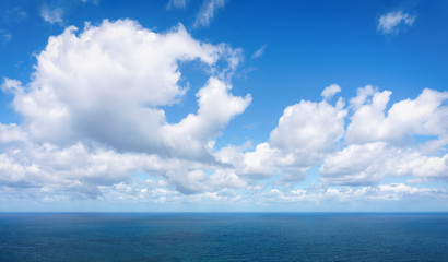 Naklejka na ściany i meble relaxing cloudscape with blue sky over the sea
