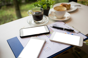 Mobile screen mock up in coffee shop