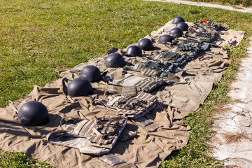 Set of military equipment tactical bulletproof vests and helmets