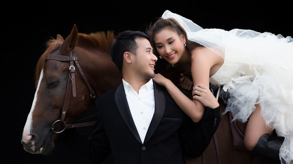 Married couple with a horse