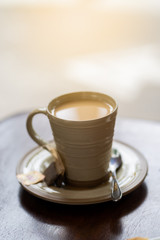 Hot coffe on the table in the morning